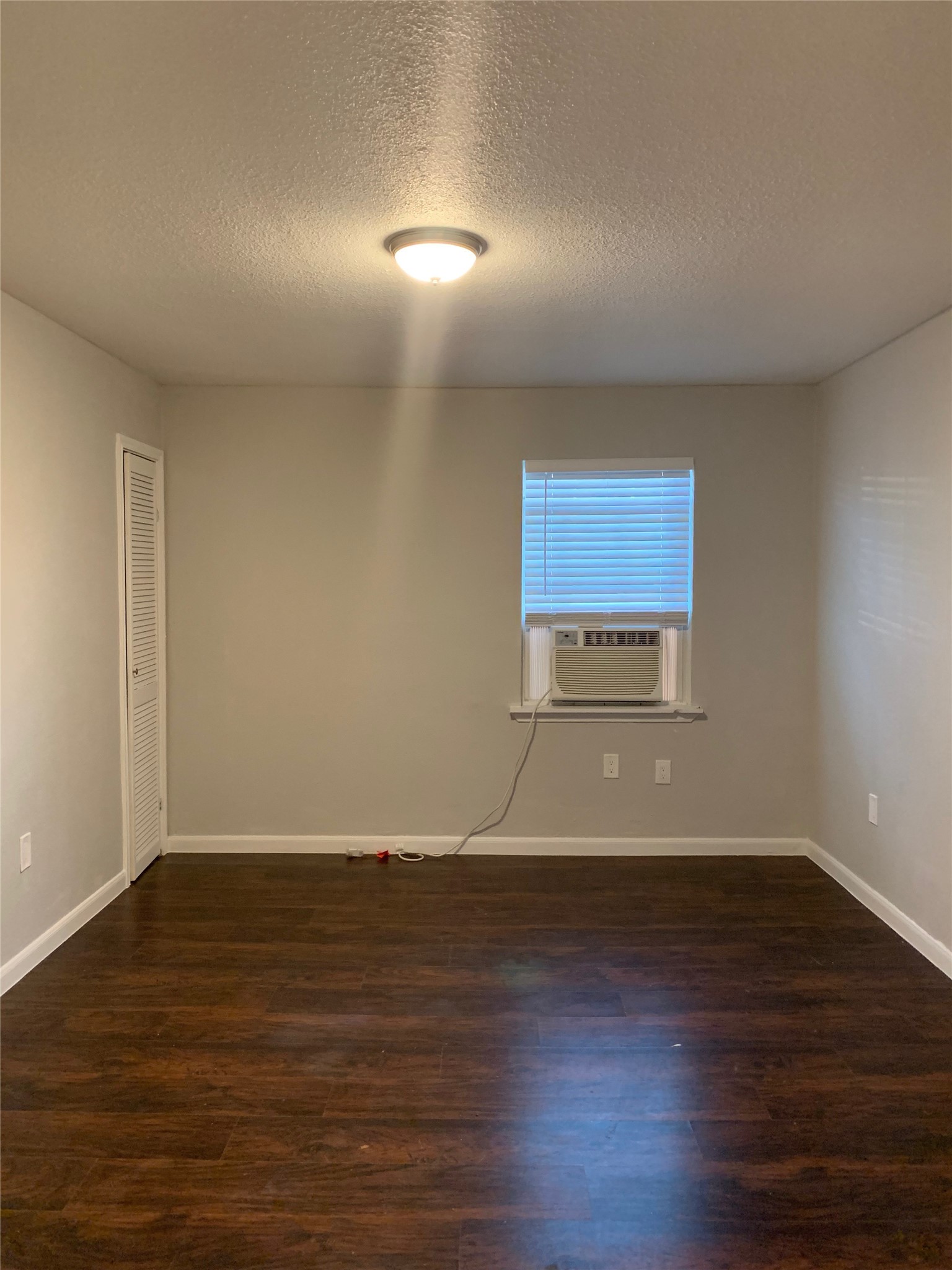 2503 Delano Street, Unit 4 Houston, TX 77004 - Photo 8 of 10 a view of a room with wooden floor