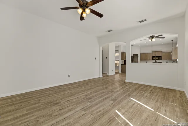a view of a kitchen with a sink and cabinet area