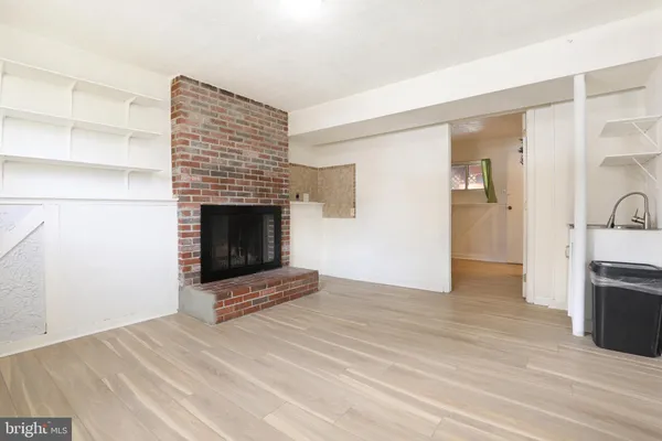 a view of a livingroom with a fireplace