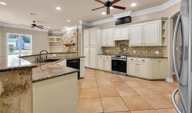 a bedroom with a bed and a table