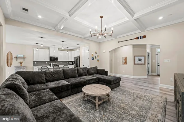 a bedroom with a bed and a ceiling fan