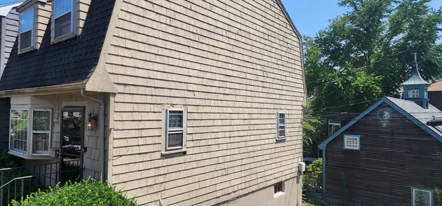 a view of a house with a white door