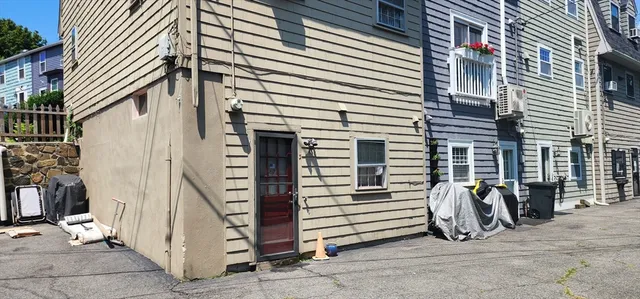 a view of a back yard of the building