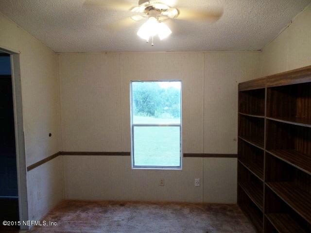 3150 Raulerson Road St. Augustine, FL 32092 - Photo 7 of 19 a view of window in an empty room