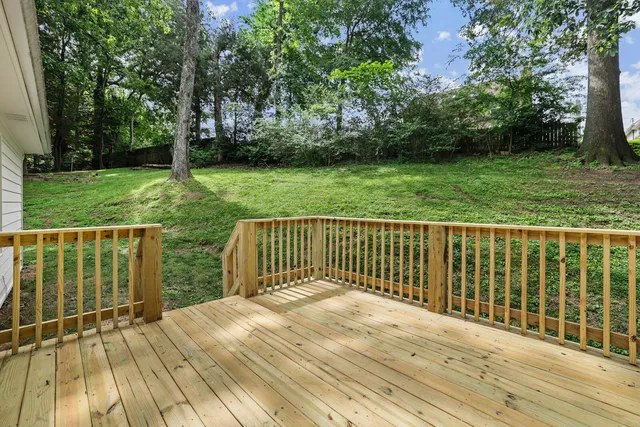 a view of backyard with deck