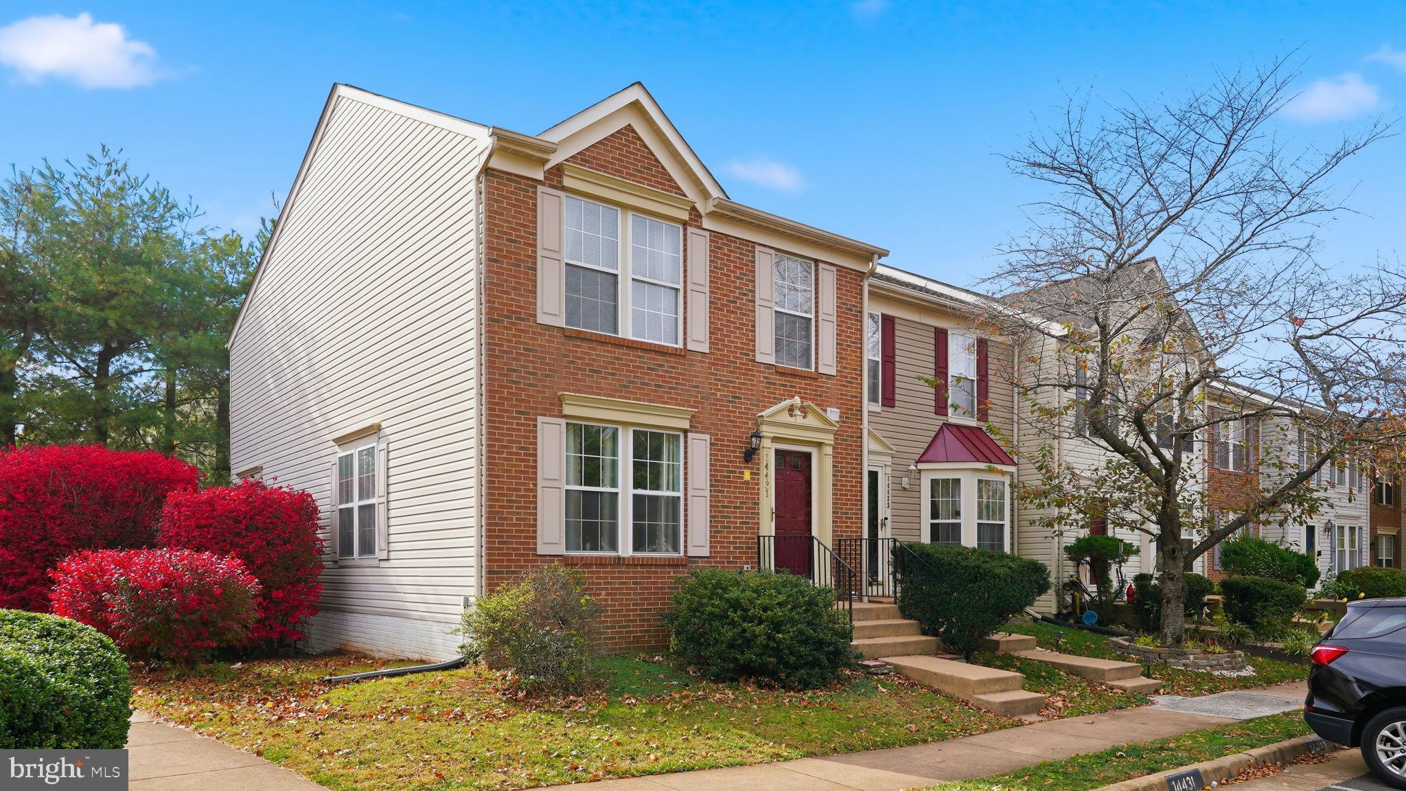 14431 Colonel Wood Road Gainesville, VA 20155 - Photo 2 of 37 a front view of a house with a yard