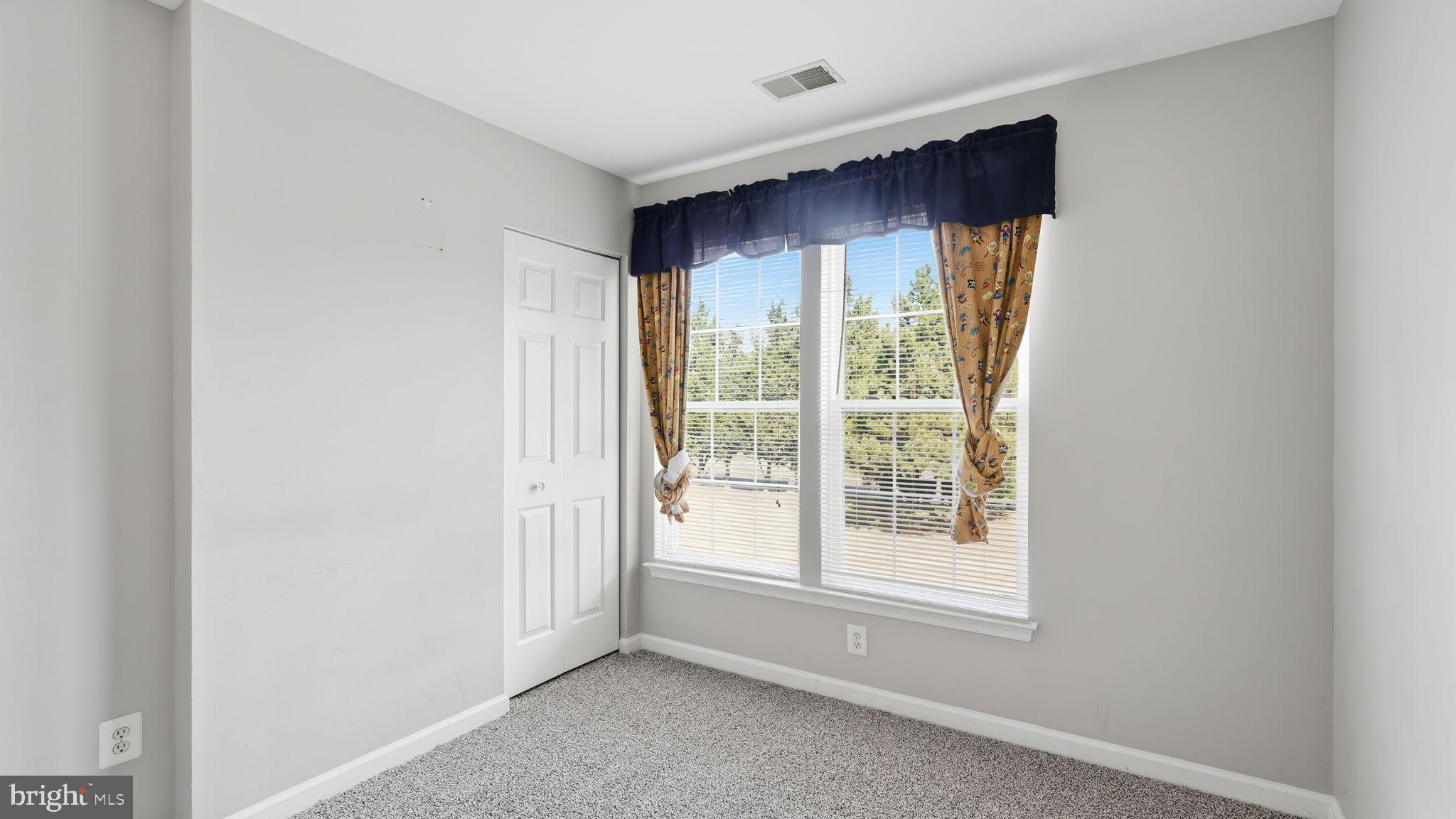 14431 Colonel Wood Road Gainesville, VA 20155 - Photo 35 of 37 a view of an empty room with a window