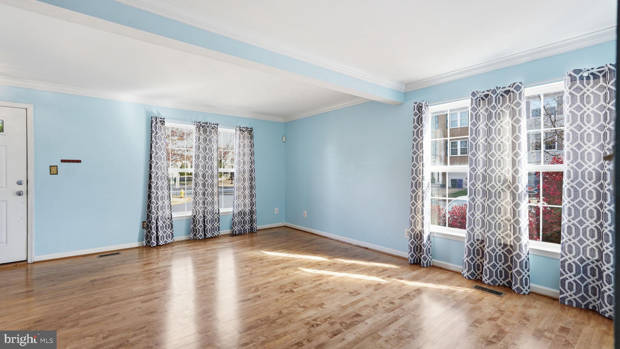 14431 Colonel Wood Road Gainesville, VA 20155 - Photo 6 of 37 a view of livingroom with furniture and wooden floor