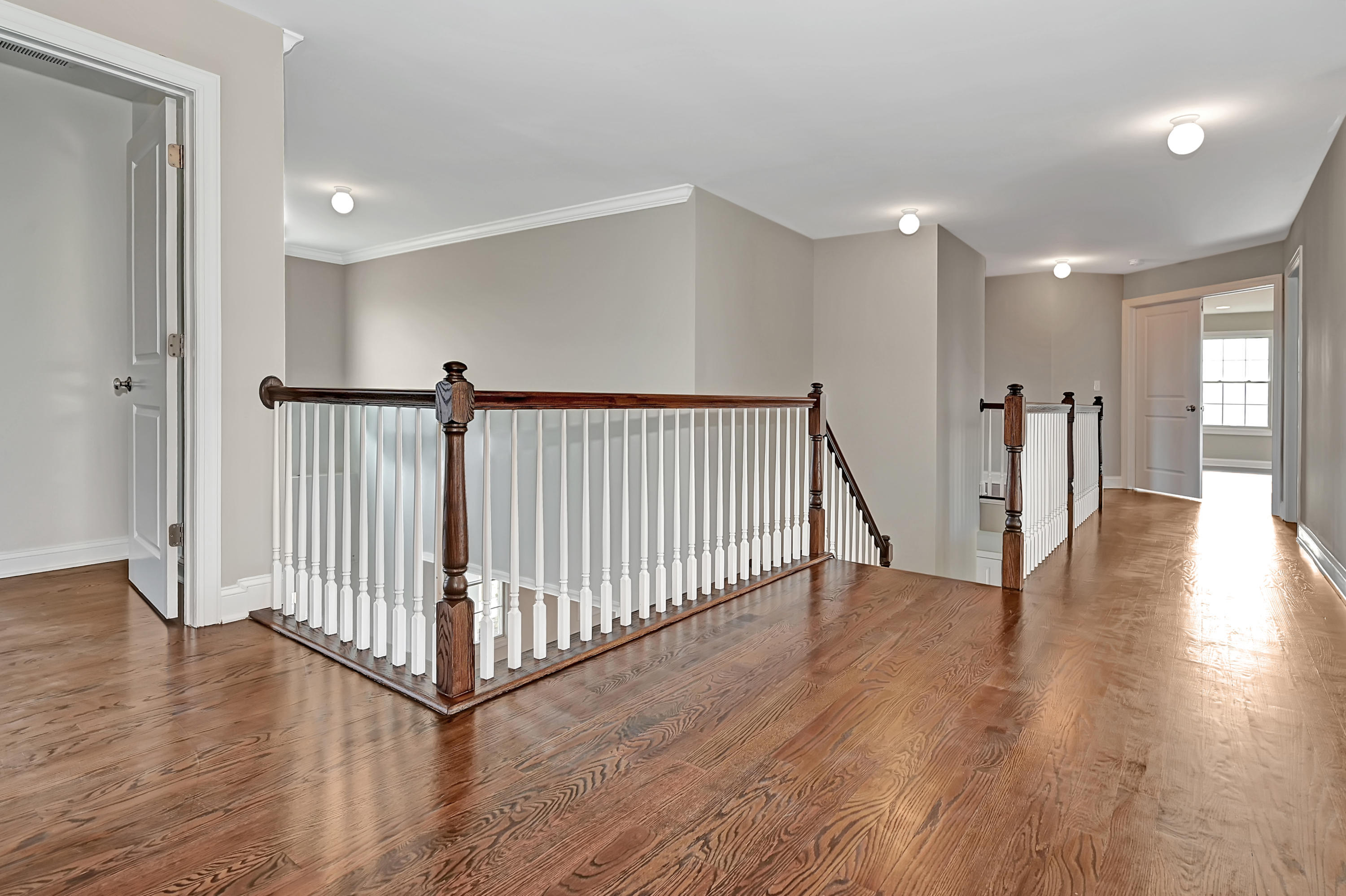3 Cook Court Millstone Township, NJ 08535 - Photo 20 of 40 a view of a hallway with wooden floor