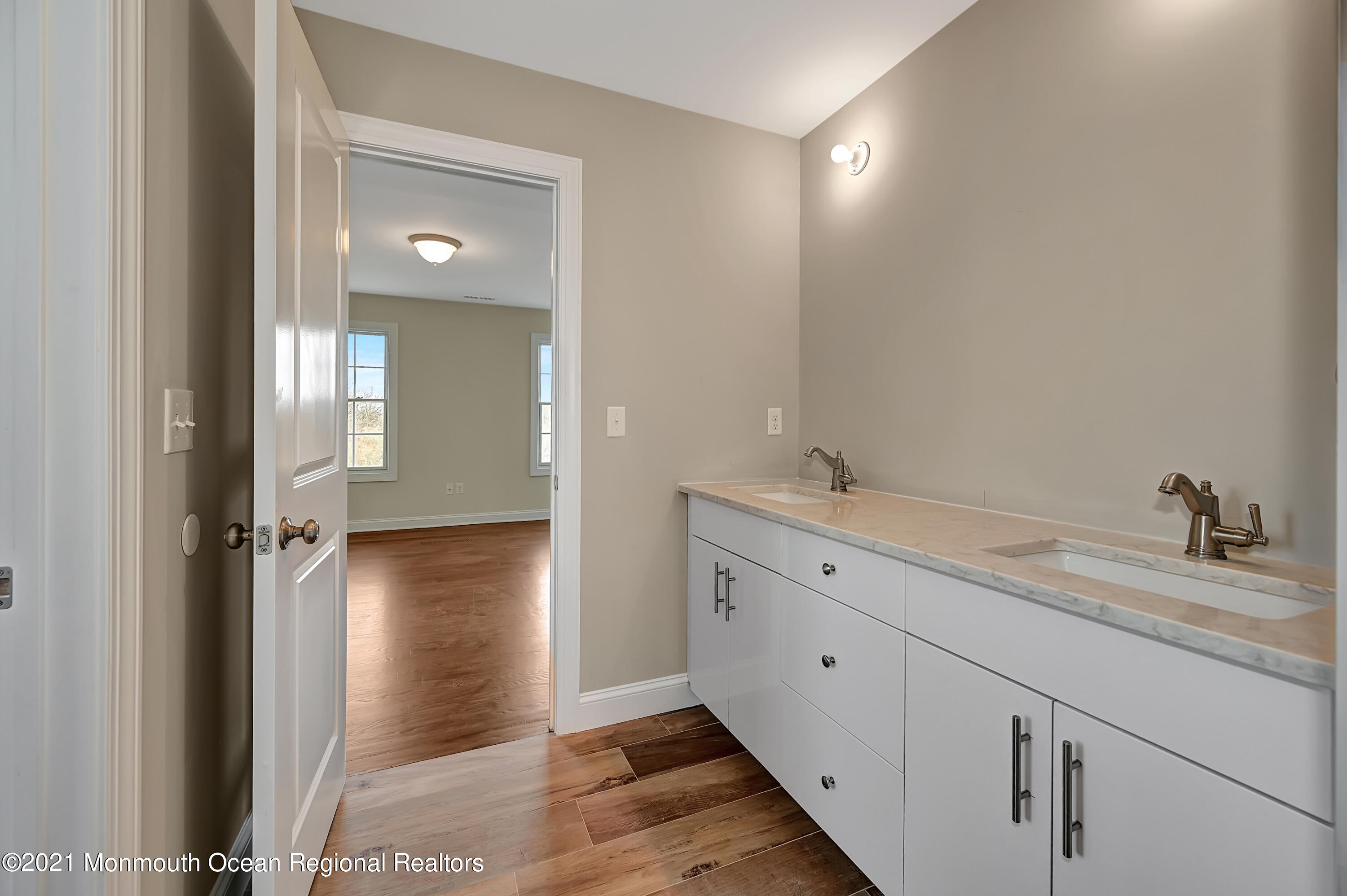 3 Cook Court Millstone Township, NJ 08535 - Photo 23 of 40 a spacious bathroom with a granite countertop sink mirror and toilet