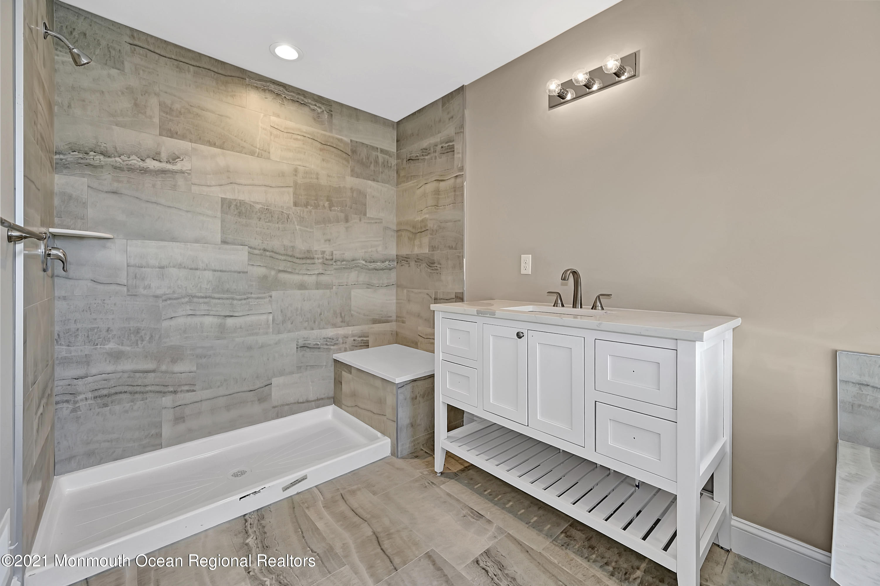3 Cook Court Millstone Township, NJ 08535 - Photo 29 of 40 a bathroom with a sink a toilet and shower