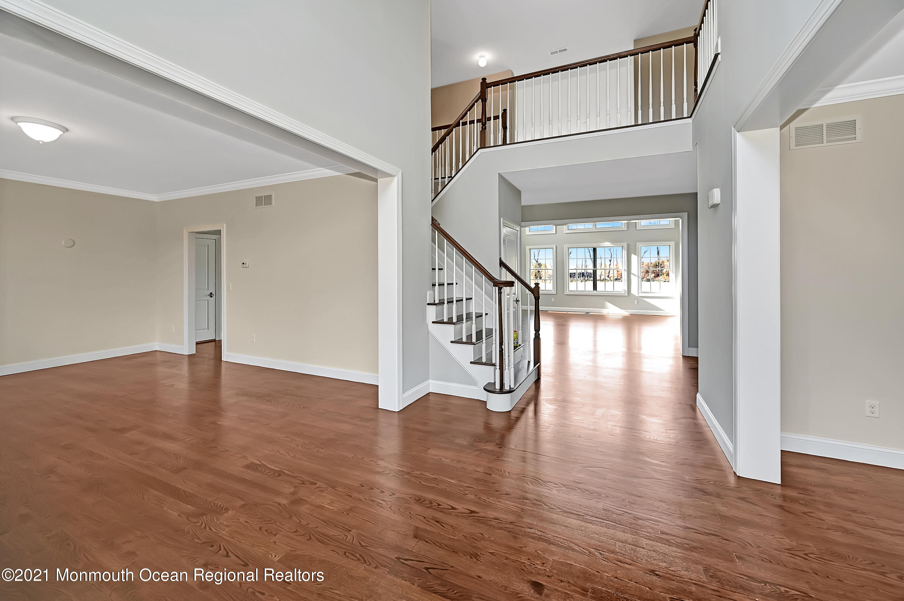 3 Cook Court Millstone Township, NJ 08535 - Photo 3 of 40 a view of an entryway with wooden floor