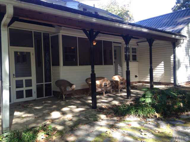 1569 Longs Store Road Roxboro, NC 27574 - Photo 17 of 22 a view of house with patio
