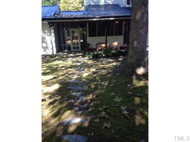 1569 Longs Store Road Roxboro, NC 27574 - Photo 21 of 22 a view of the porch of the house