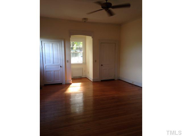 1569 Longs Store Road Roxboro, NC 27574 - Photo 8 of 22 a view of a livingroom with wooden floor