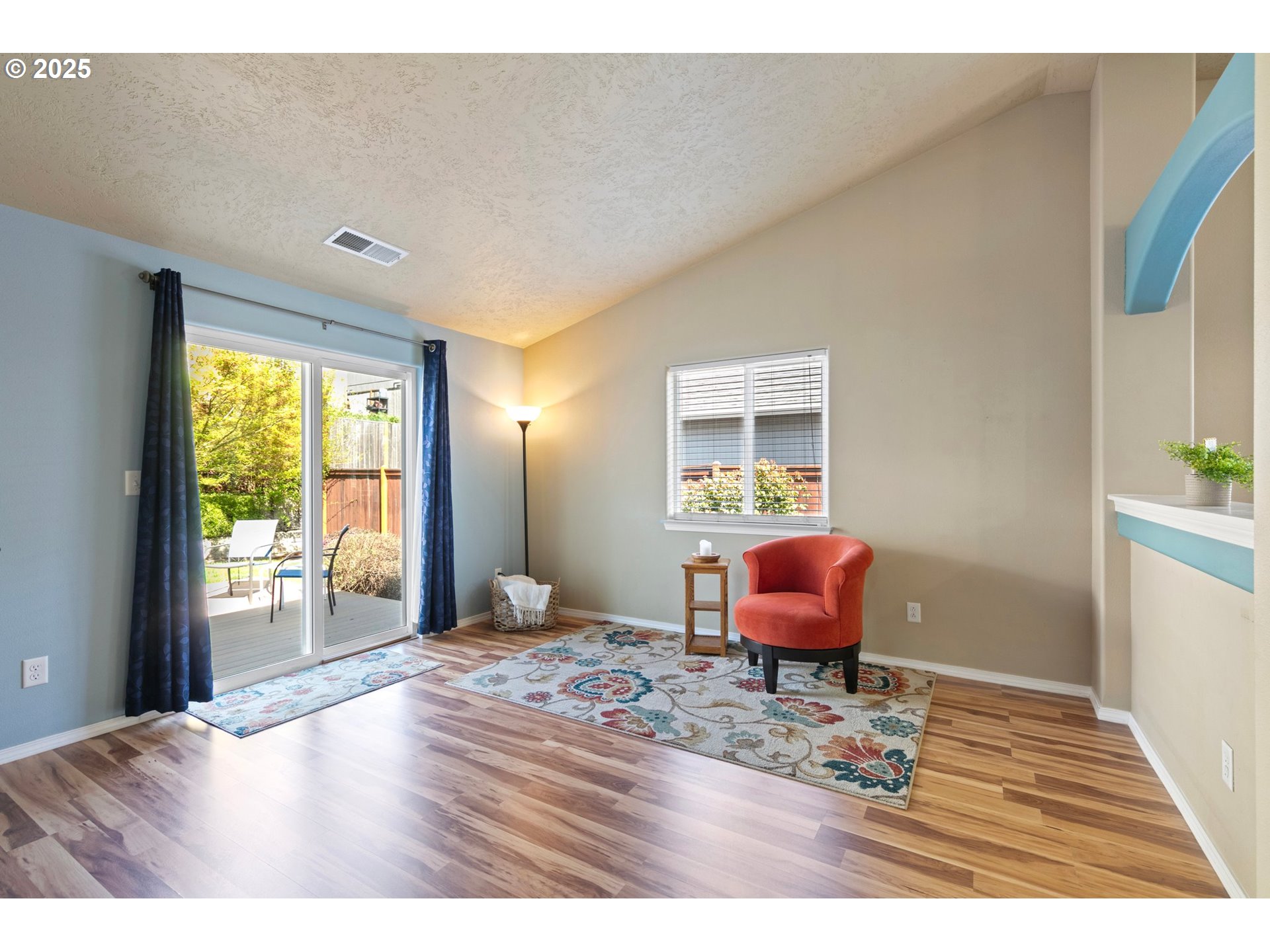 4912 Holly Street Springfield, OR 97478 - Photo 6 of 37 a living room with furniture and a wooden floor