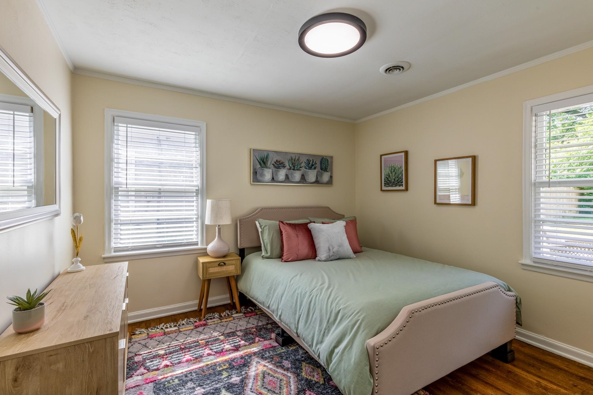 4620 Sea Isle Road Memphis, TN 38117 - Photo 13 of 14 a bedroom with a large bed and a window