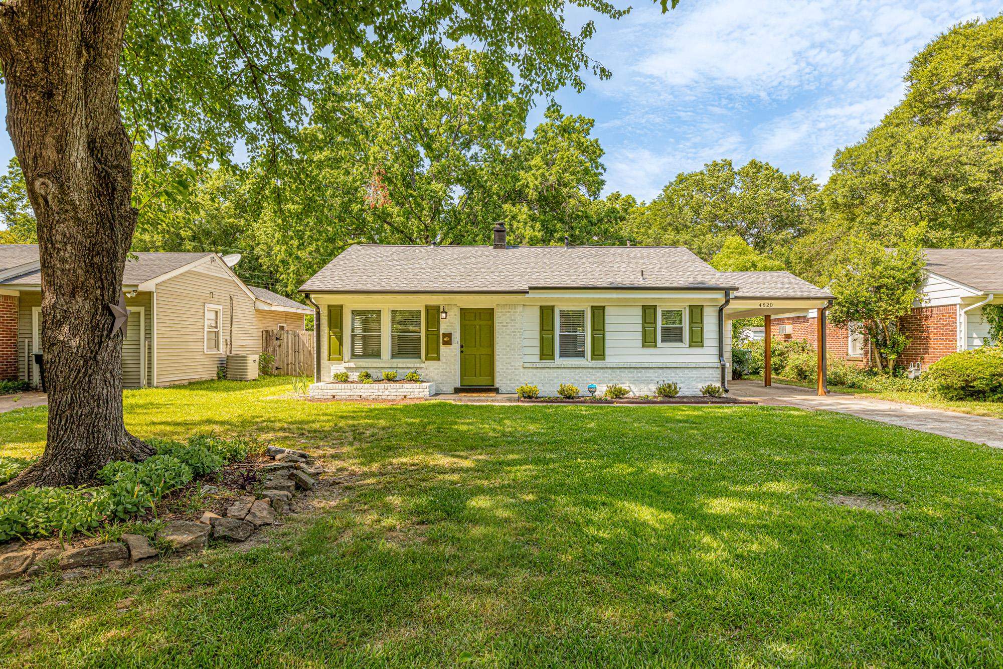 4620 Sea Isle Road Memphis, TN 38117 - Photo 2 of 14 a front view of a house with a garden