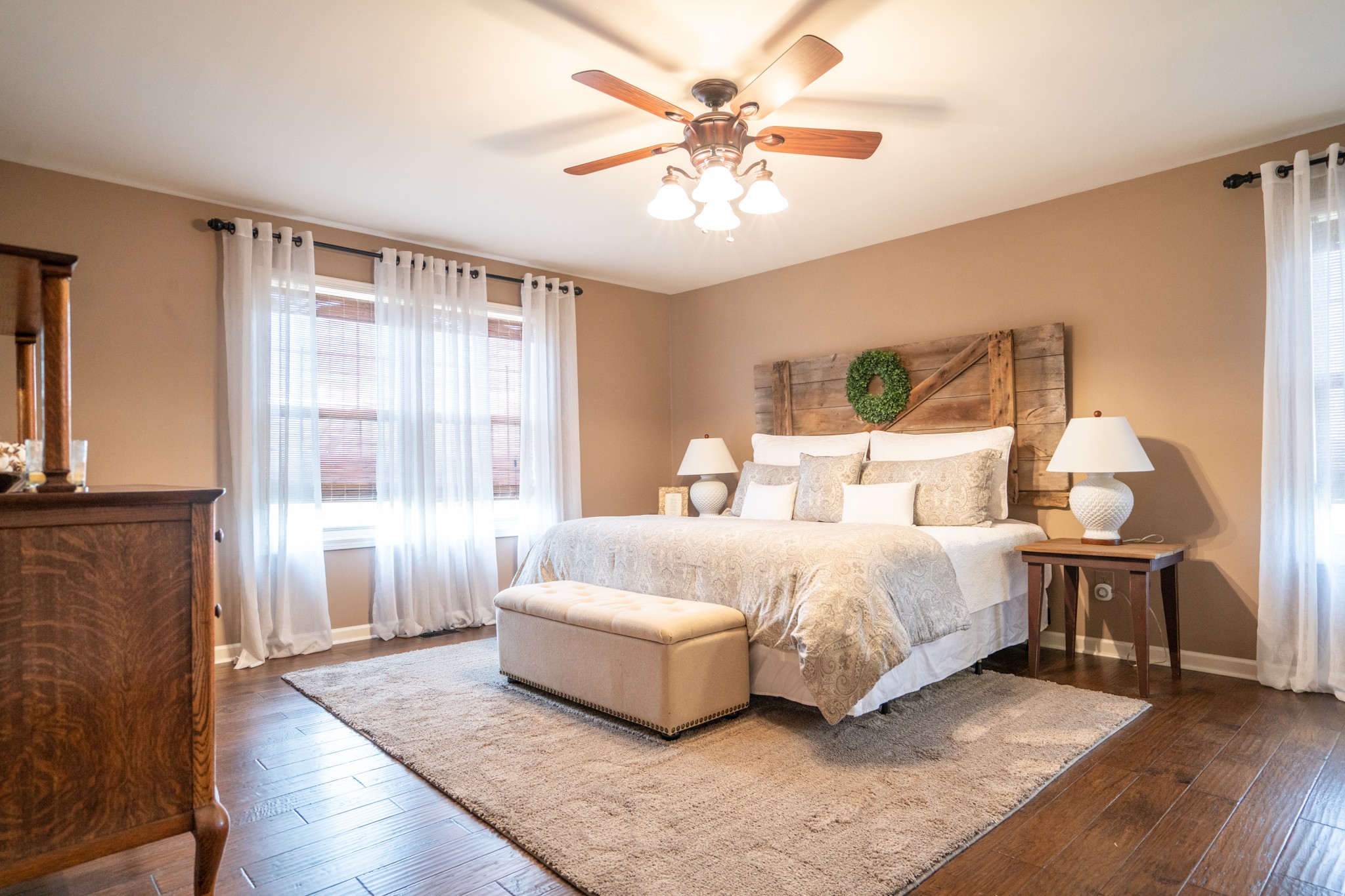 3065 Greens Mill Road Spring Hill, TN 37174 - Photo 14 of 50 a spacious bedroom with a bed and a chandelier
