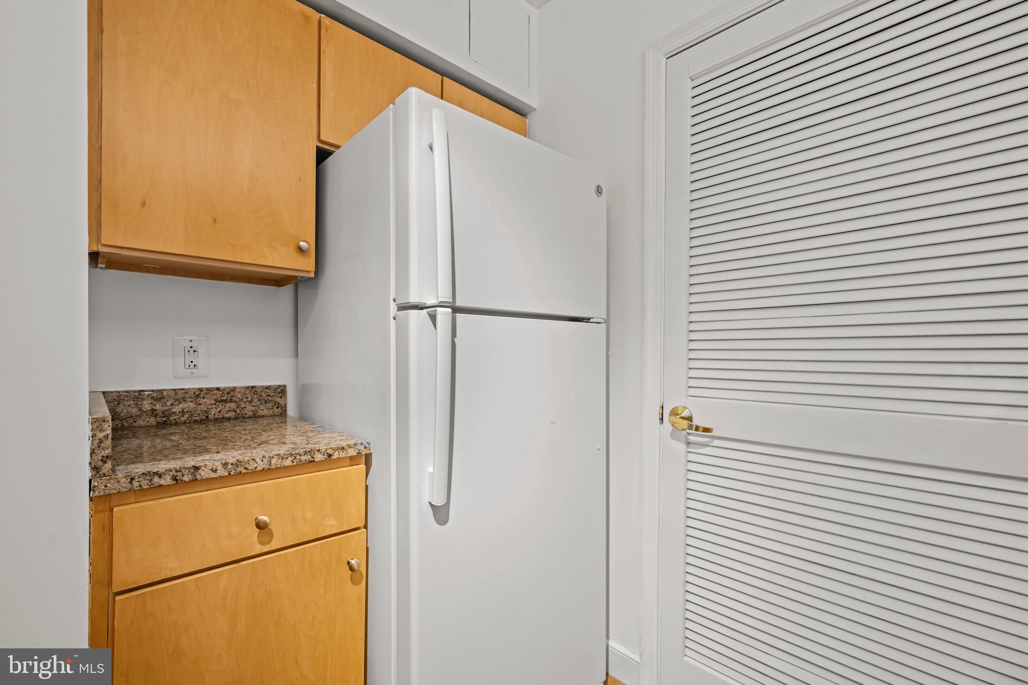 631 D Street Northwest, Unit 632 Washington, DC 20004 - Photo 18 of 78 a utility room with dryer and washer