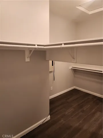 a view of small space with racks on the wall