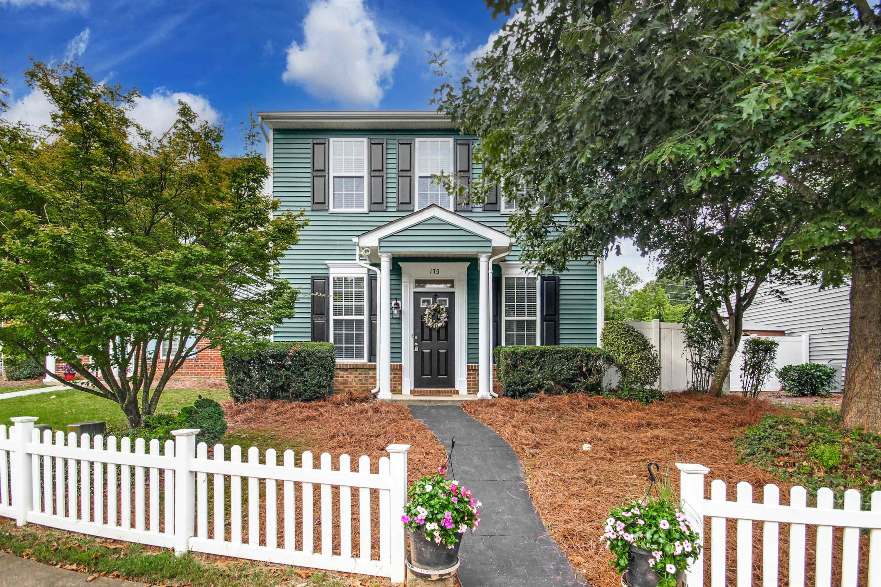 175 Sioux Lane Clayton, NC 27520 - Photo 1 of 26 a front view of a house with a porch