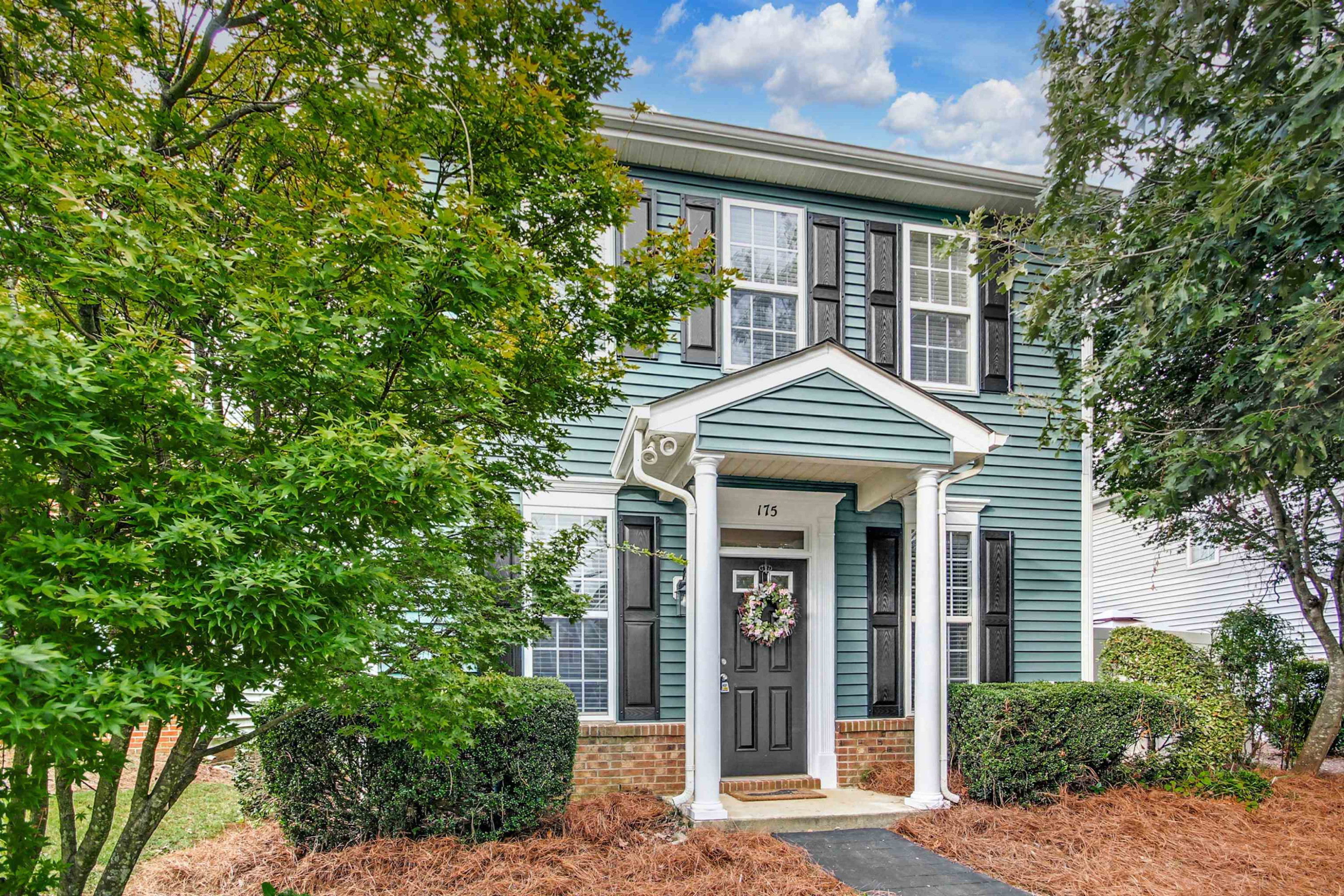 175 Sioux Lane Clayton, NC 27520 - Photo 2 of 26 front view of house with a small yard