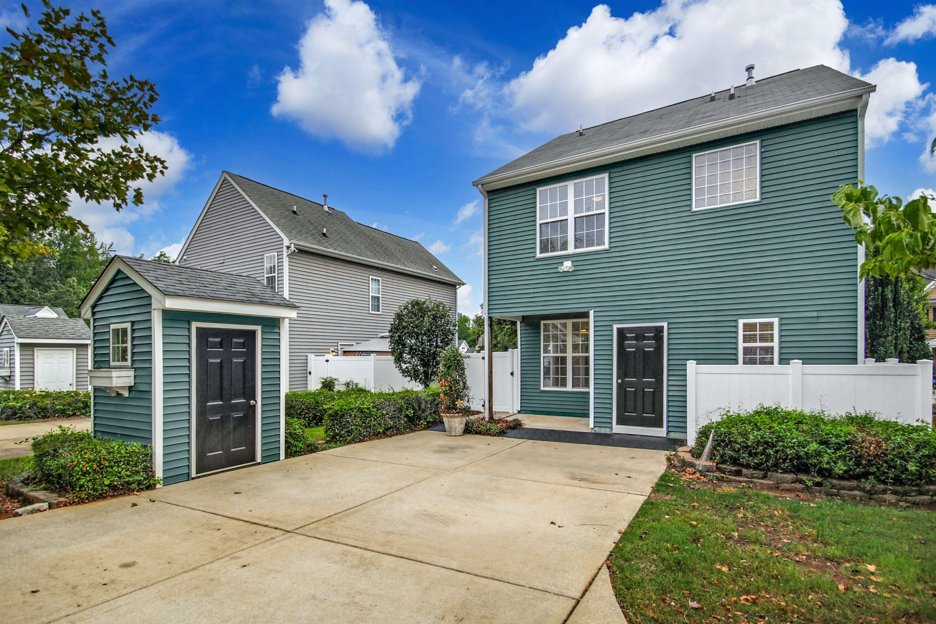 175 Sioux Lane Clayton, NC 27520 - Photo 24 of 26 a view of house with backyard and glass windows