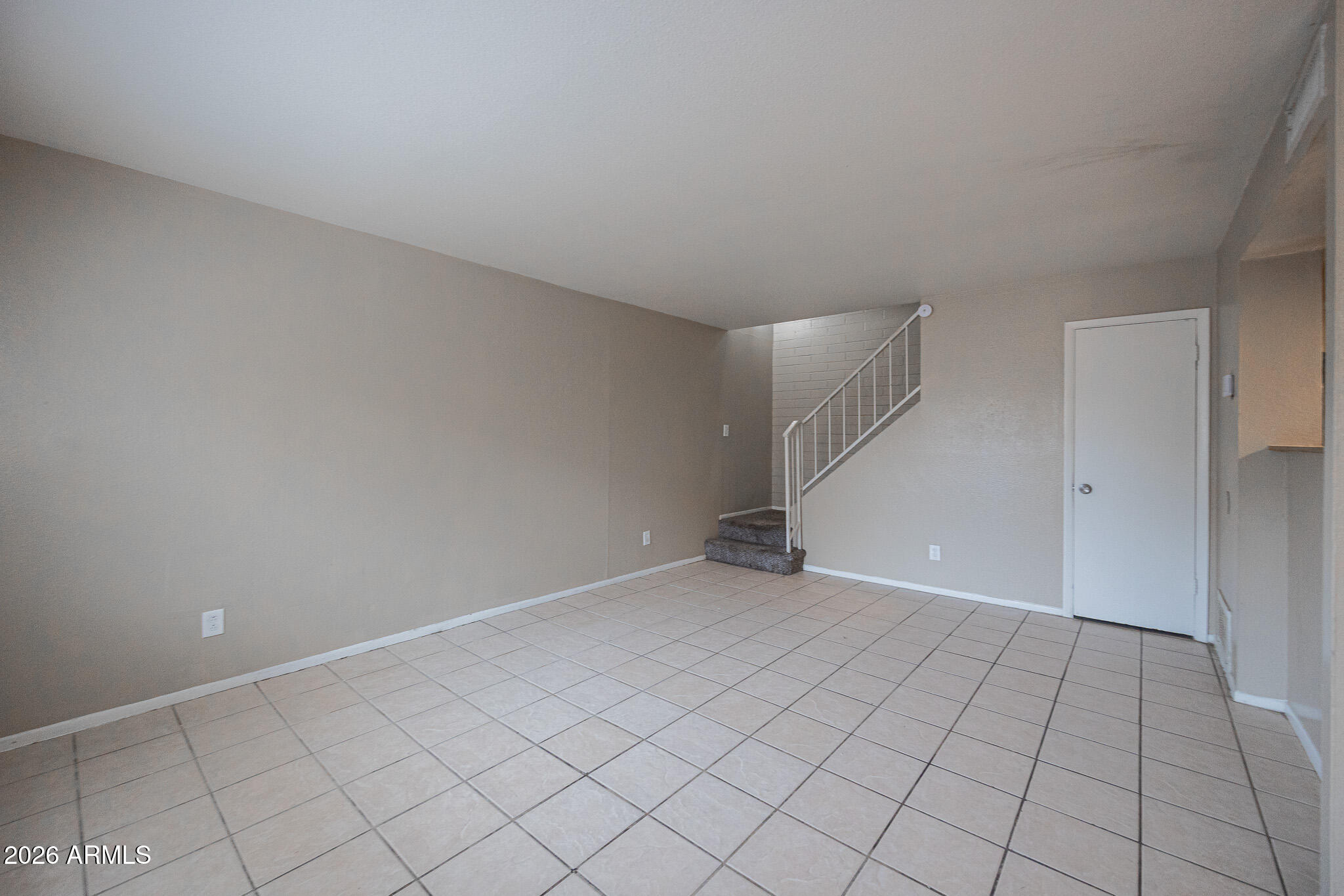 5041 North 39th Lane Phoenix, AZ 85019 - Photo 4 of 15 a view of an empty room