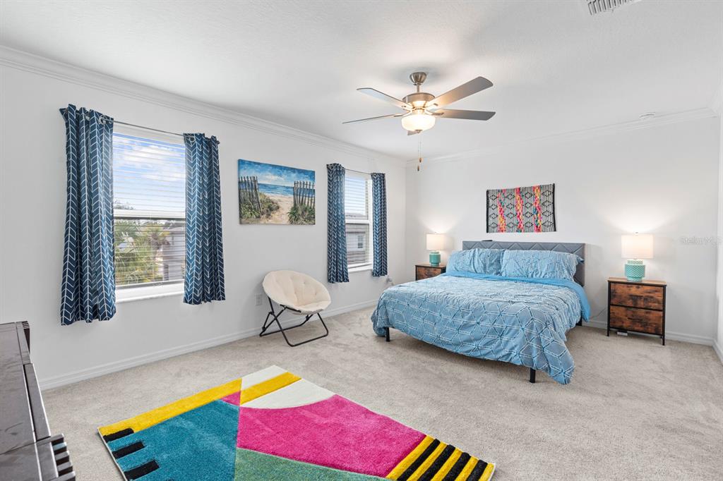 36498 Camp Fire Terrace Zephyrhills, FL 33541 - Photo 17 of 38 a living room with furniture and a window