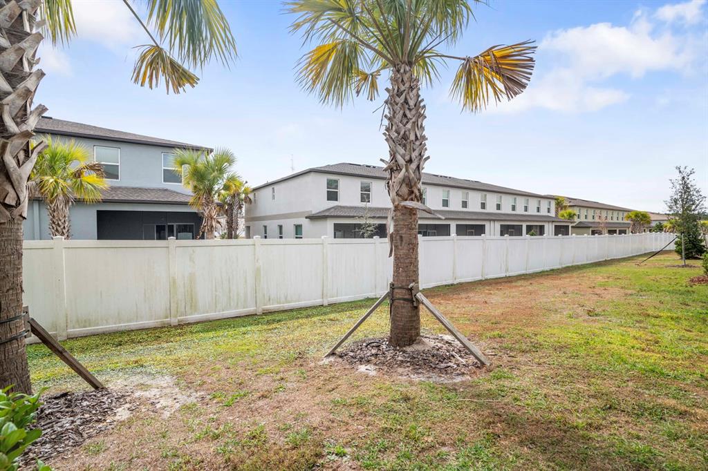 36498 Camp Fire Terrace Zephyrhills, FL 33541 - Photo 32 of 38 a house with swimming pool