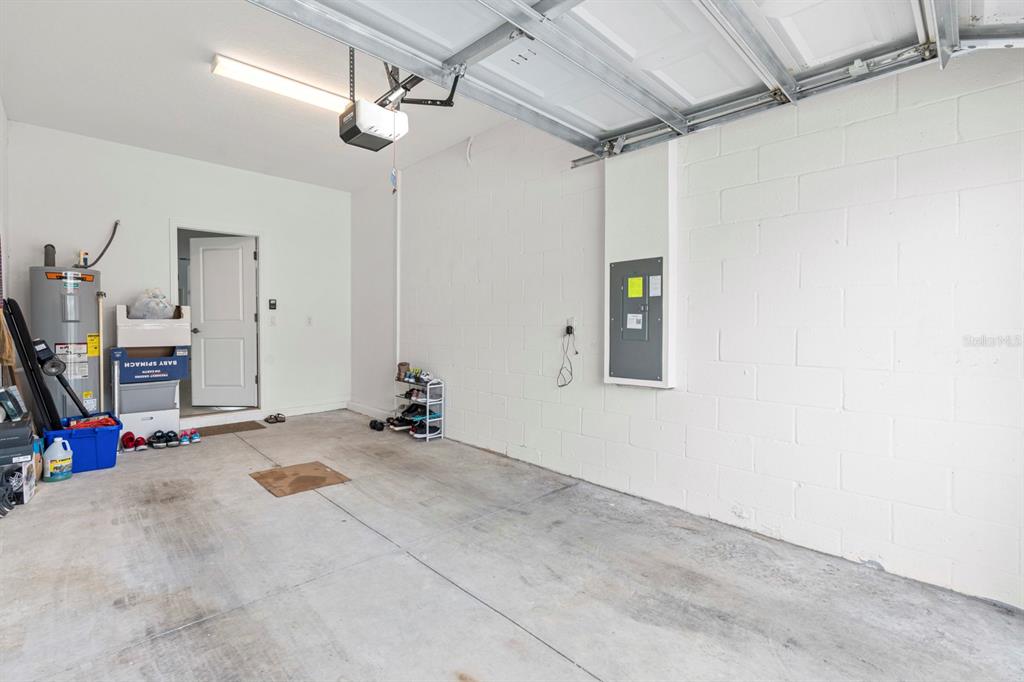 36498 Camp Fire Terrace Zephyrhills, FL 33541 - Photo 33 of 38 a view of a room with gym equipment