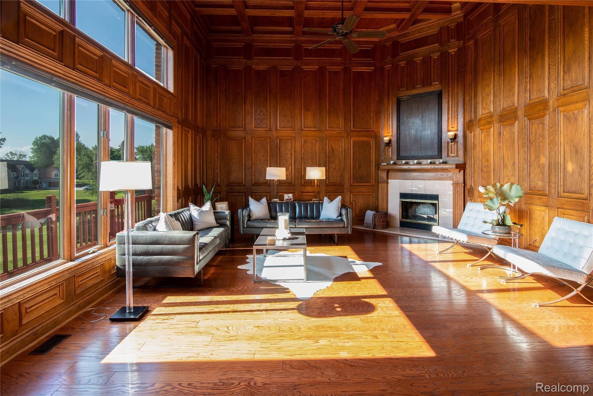 10165 Marshall Road South Lyon, MI 48178 - Photo 22 of 79 Custom Oak Great Room w/ Natural Fireplace & Amazing Views of Fish Lake