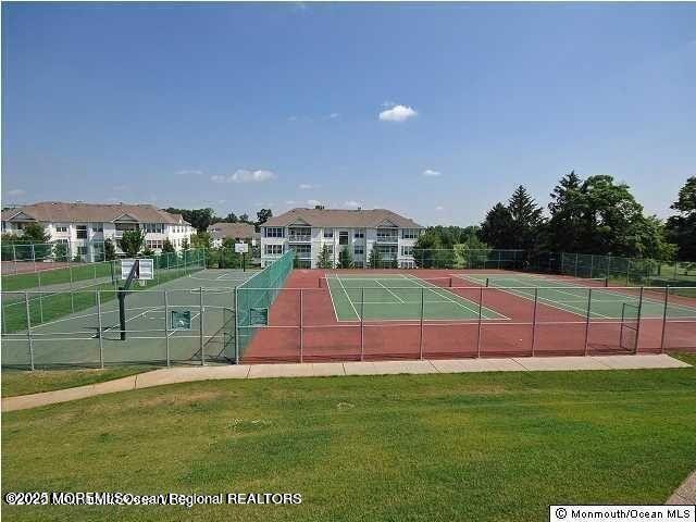 410 St Andrews Place Manalapan, NJ 07726 - Photo 21 of 23 a view of a tennis court