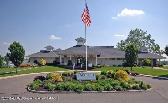 a view of a swimming pool and a chairs