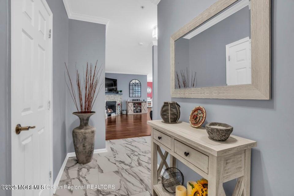410 St Andrews Place Manalapan, NJ 07726 - Photo 3 of 23 a kitchen with stainless steel appliances granite countertop a stove and a refrigerator