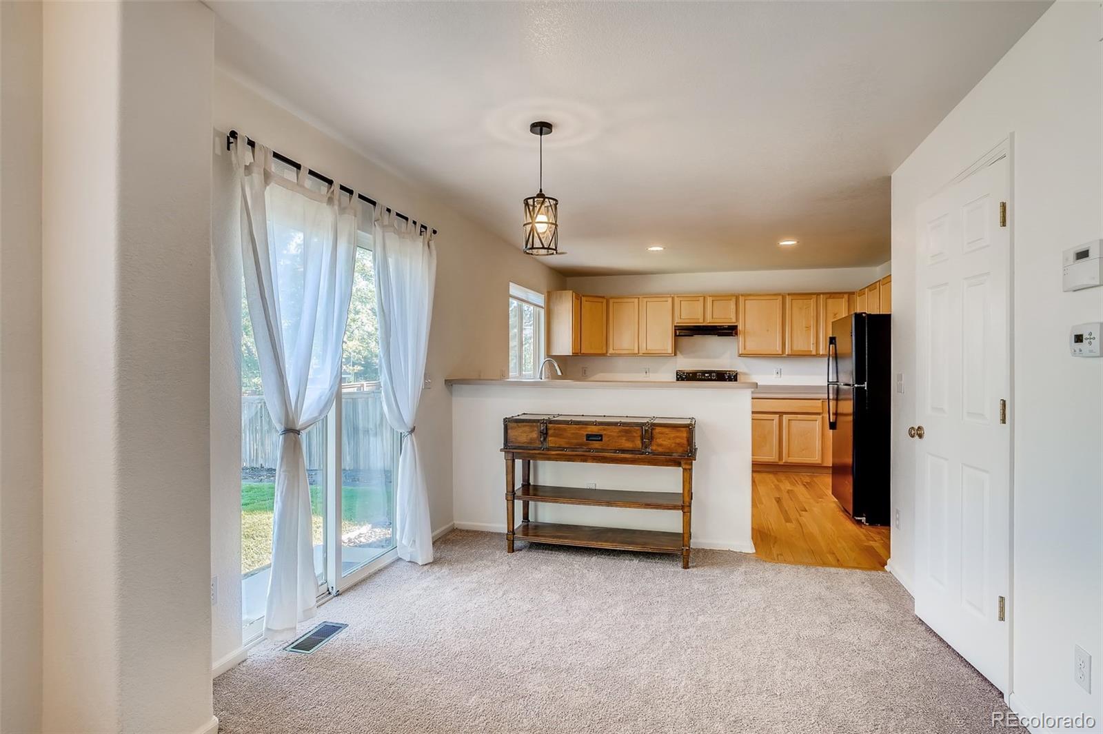 9894 Saybrook Street Highlands Ranch, CO 80126 - Photo 8 of 26 Gallery Image 8