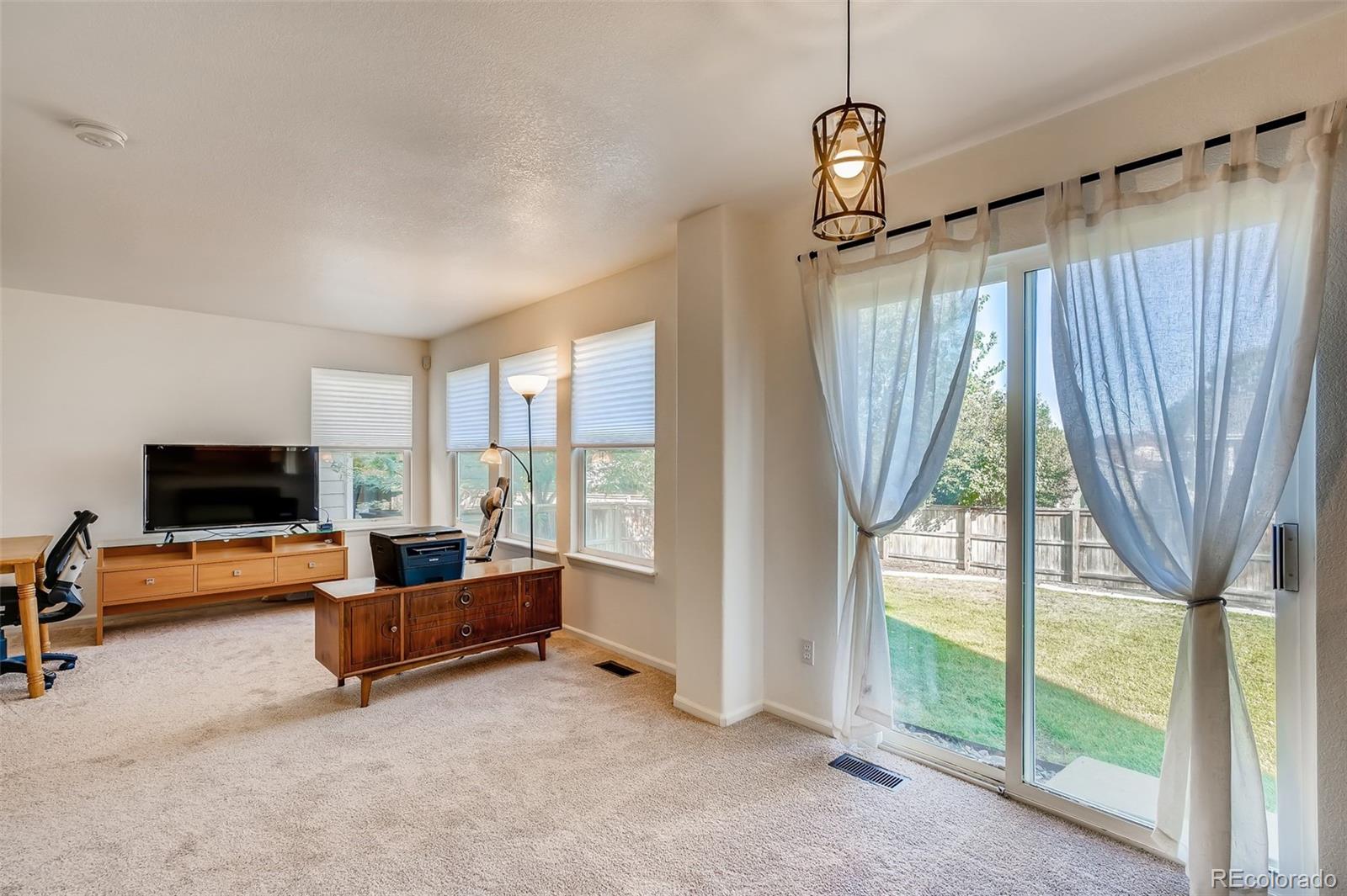 9894 Saybrook Street Highlands Ranch, CO 80126 - Photo 9 of 26 Gallery Image 9