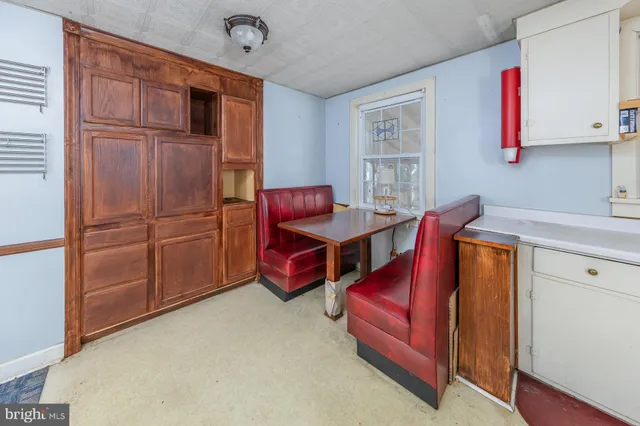 a room with furniture and window