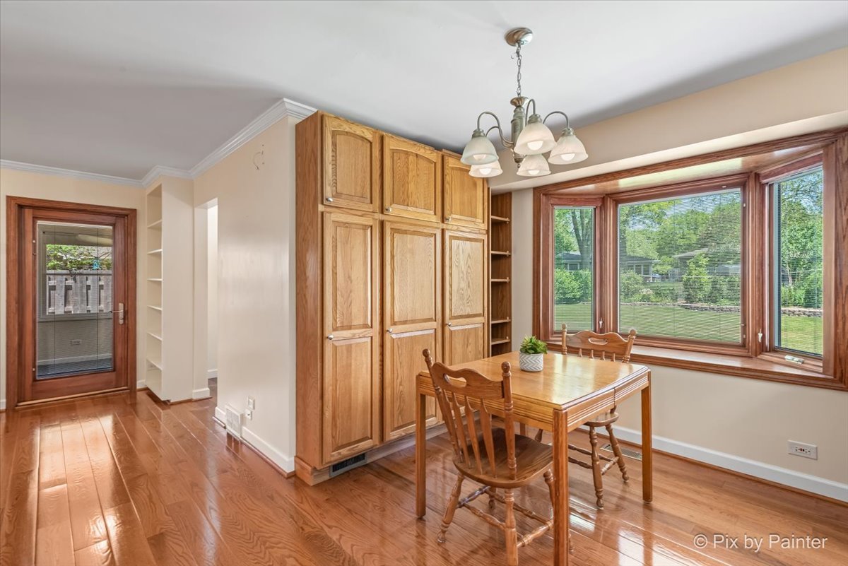 1599 Burning Trail Wheaton, IL 60189 - Photo 21 of 64 a view of a dining room with furniture window and outside view