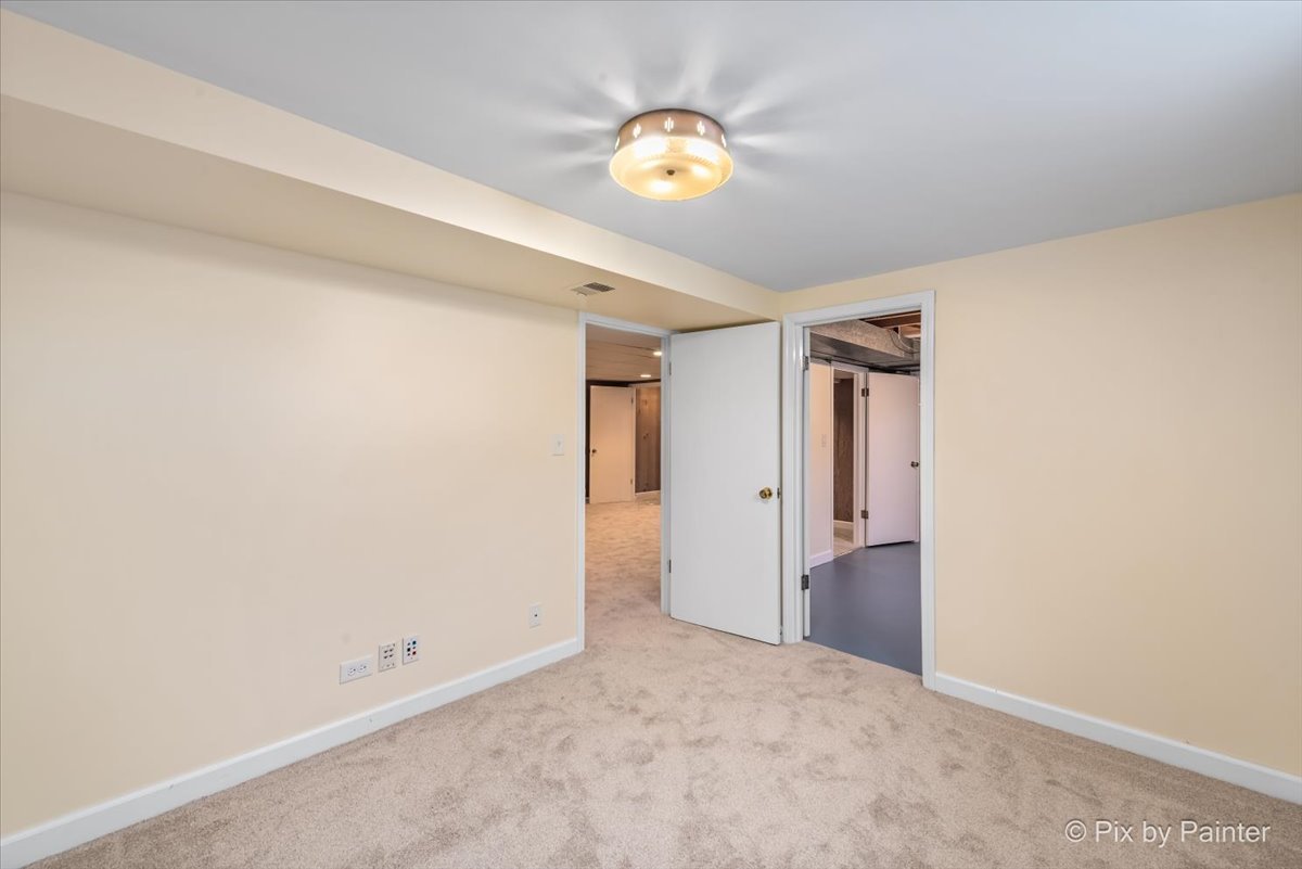 1599 Burning Trail Wheaton, IL 60189 - Photo 41 of 64 a view of an empty room and a window