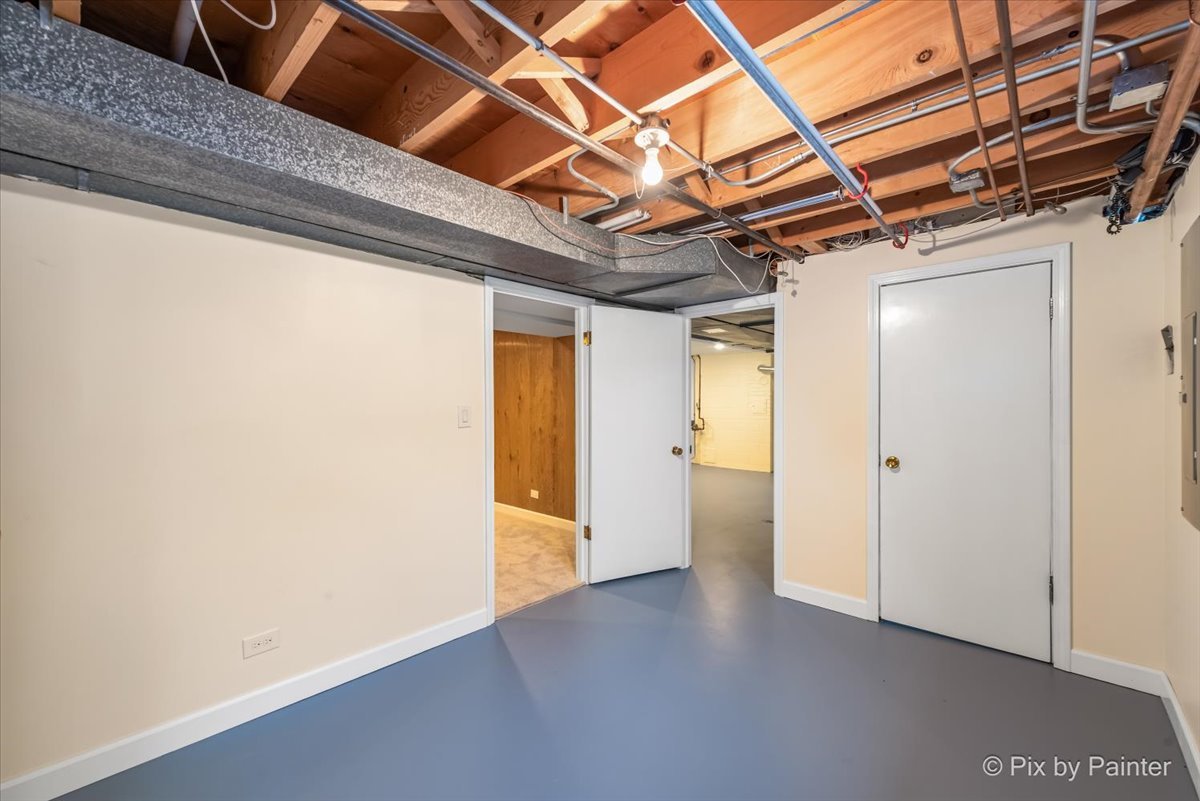 1599 Burning Trail Wheaton, IL 60189 - Photo 42 of 64 a view of hallway with wooden walls