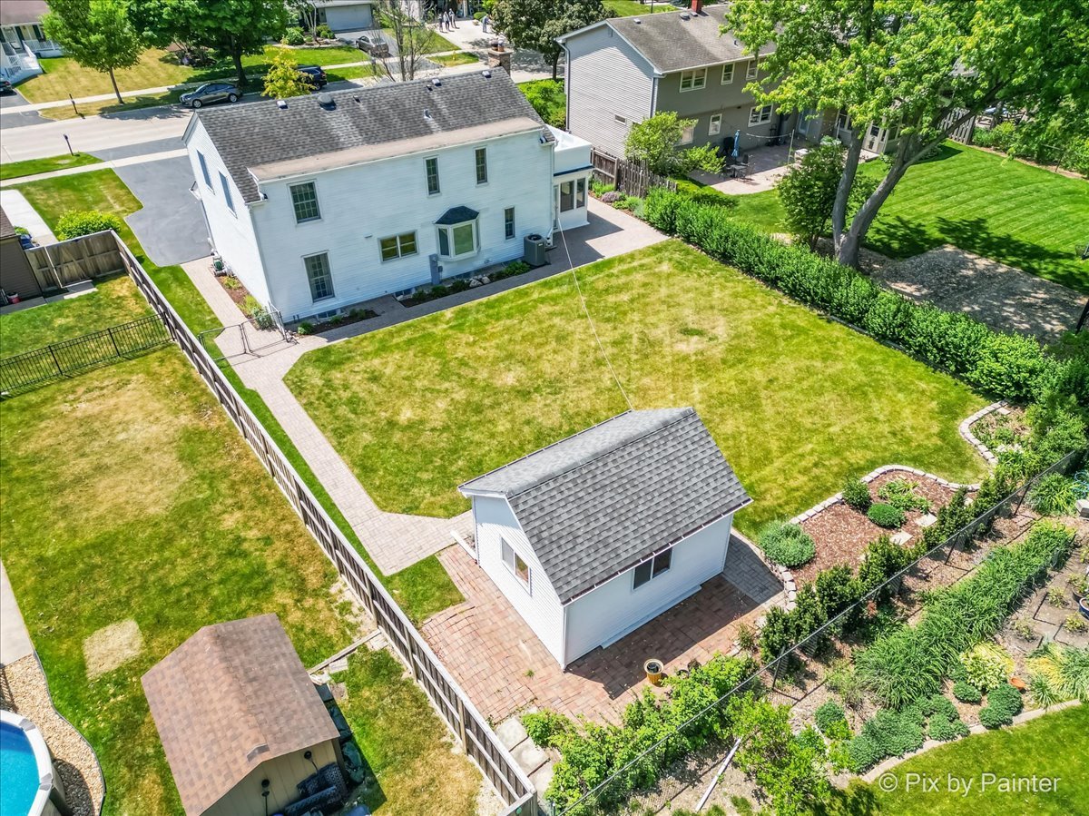 1599 Burning Trail Wheaton, IL 60189 - Photo 47 of 64 an aerial view of a house with swimming pool