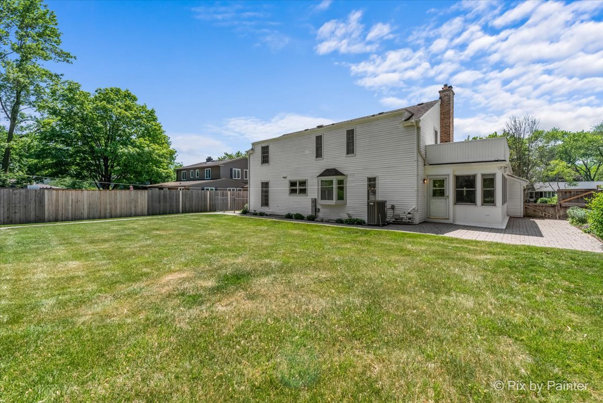 1599 Burning Trail Wheaton, IL 60189 - Photo 48 of 64 a front view of a house with garden