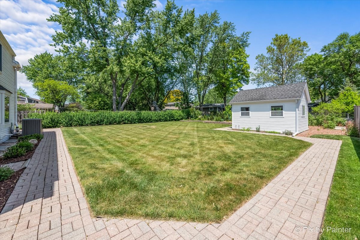 1599 Burning Trail Wheaton, IL 60189 - Photo 49 of 64 a house with green field