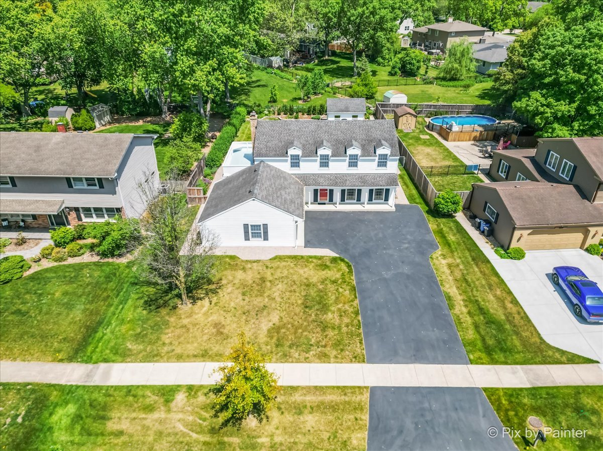1599 Burning Trail Wheaton, IL 60189 - Photo 60 of 64 an aerial view of a house with swimming pool garden and patio