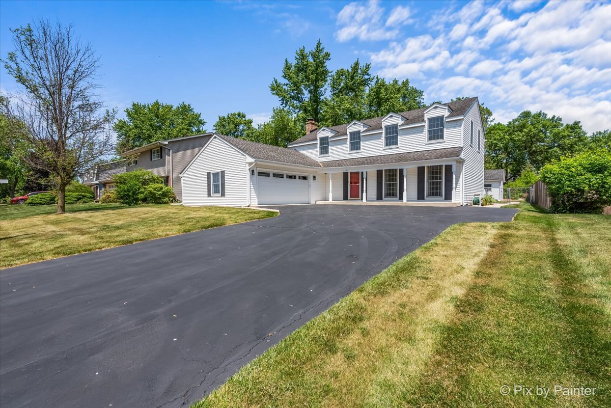 1599 Burning Trail Wheaton, IL 60189 - Photo 63 of 64 a front view of a house with a yard