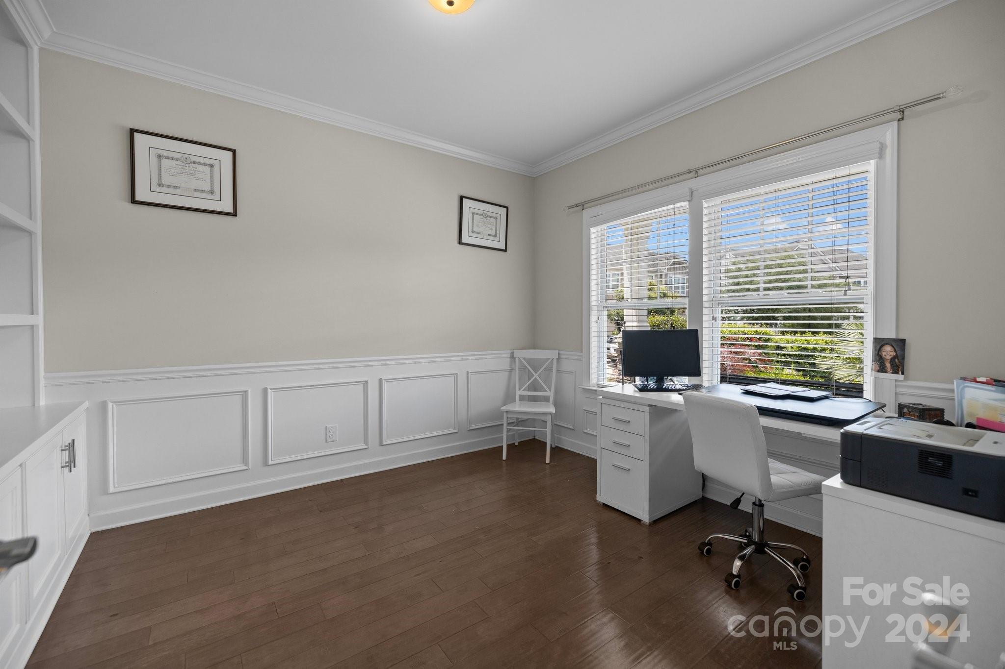 2061 Fuschia Court Fort Mill, SC 29708 - Photo 12 of 45 a view of a workspace with furniture and a window