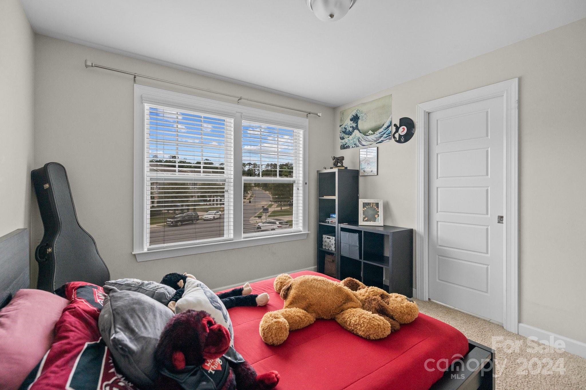 2061 Fuschia Court Fort Mill, SC 29708 - Photo 29 of 45 a bedroom with two large bed and a window
