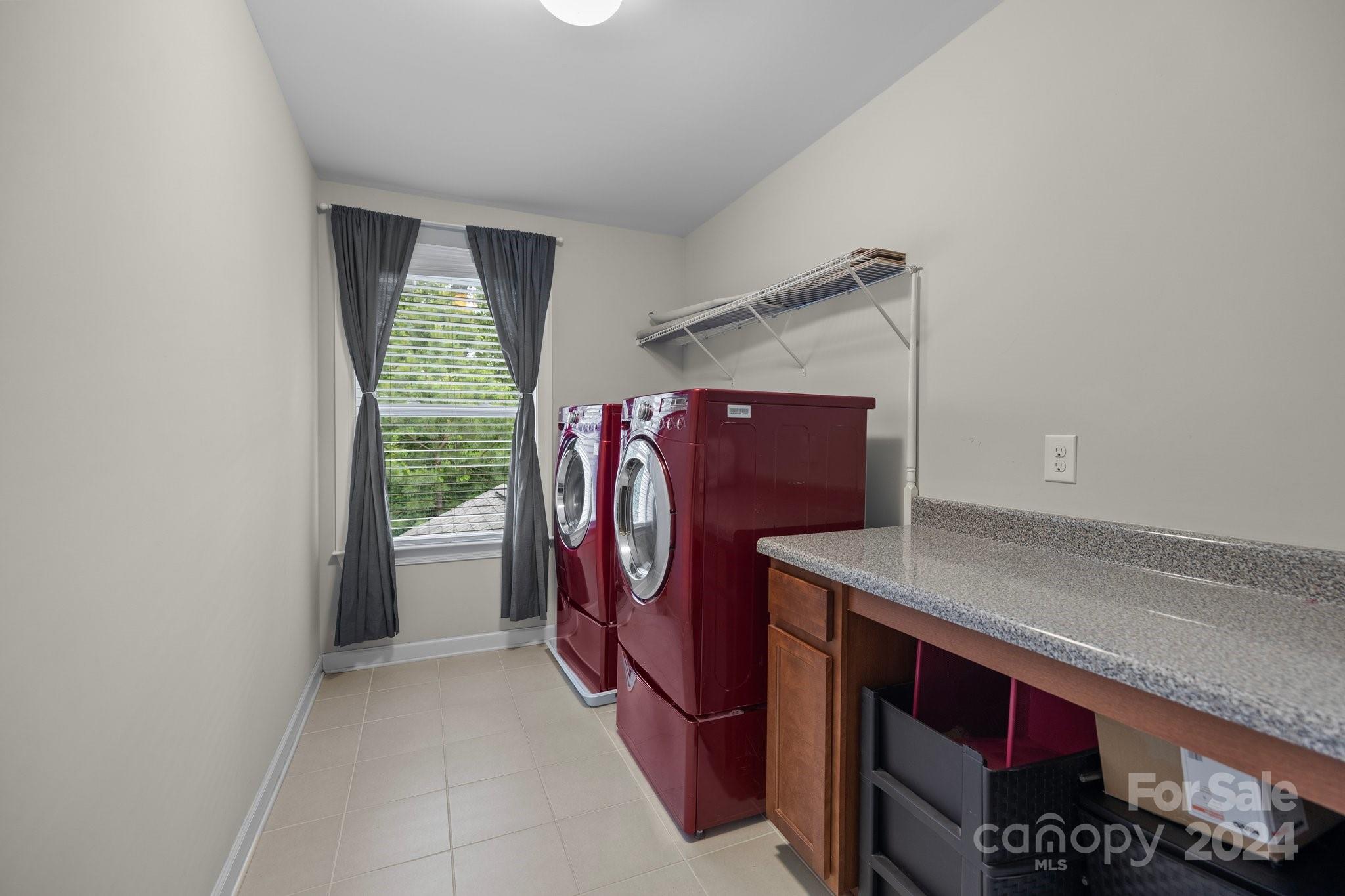 2061 Fuschia Court Fort Mill, SC 29708 - Photo 30 of 45 a utility room with dryer and washer